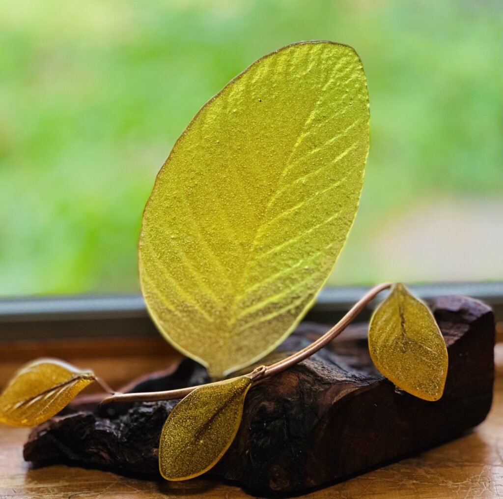 Amber glass Leaves and vine on live edge wood